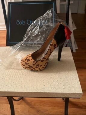 Leopard Print Platform Pump with Black Heel & Red Tassel